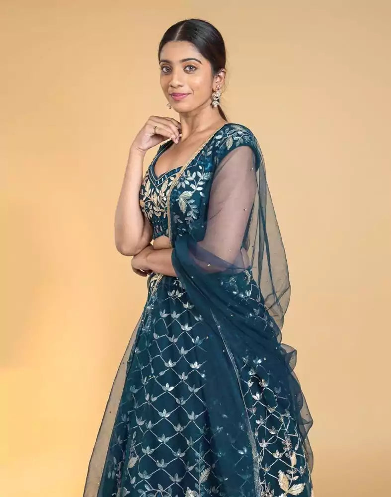 Image of Designer Peacock Blue Floral Netted gotta patti Crop Top and lehenga set
