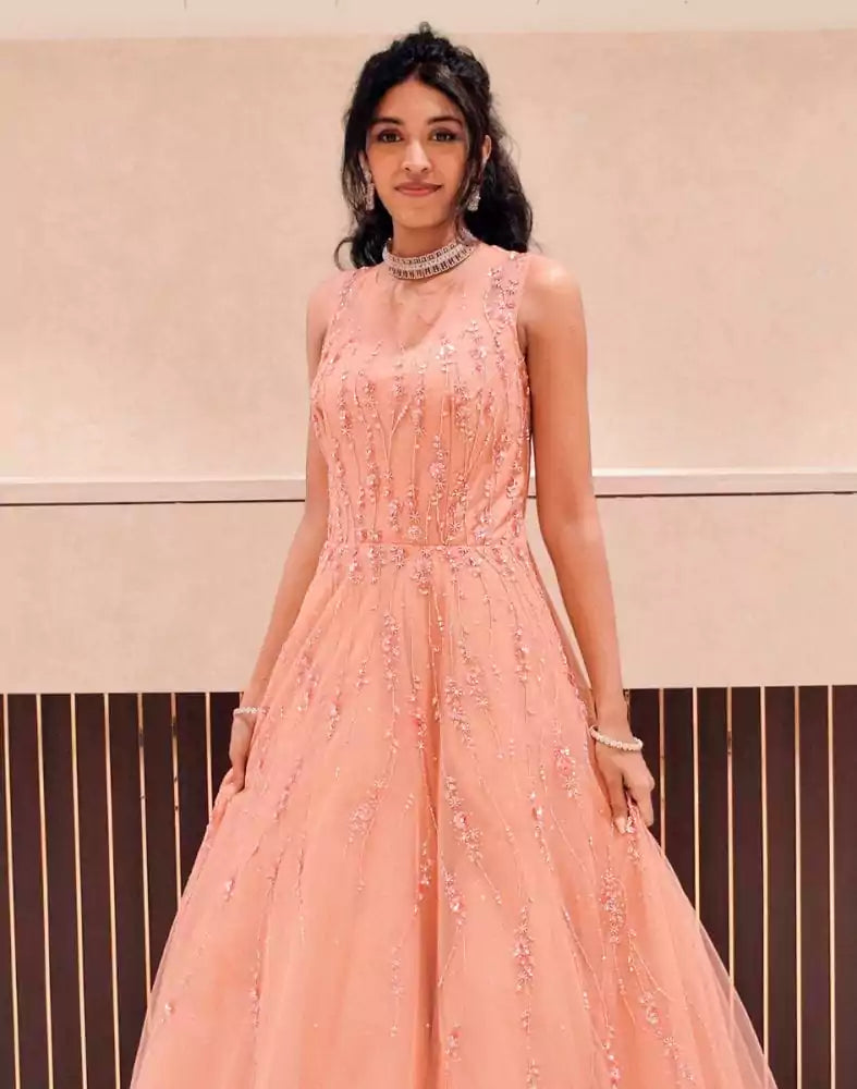Image of Peach fully flared Netted Embellished Gown