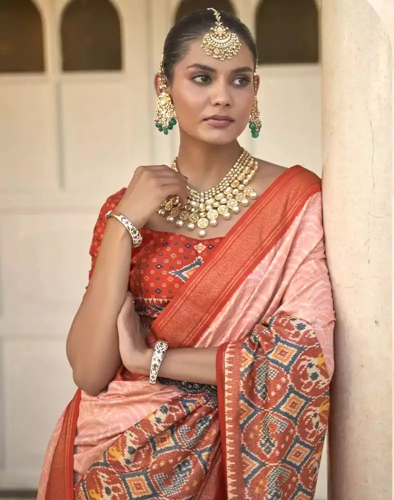 Image of Peach Bandhini Print Patola Saree