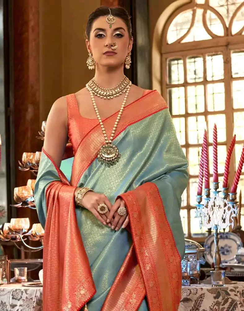 Image of Emerald Sky Blue Floral Weaving Soft Silk Saree