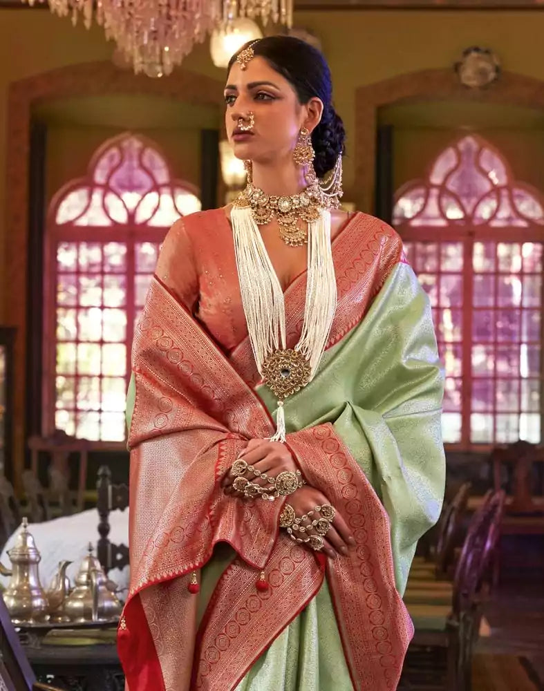 Image of Green Self Design Weaving Soft Silk Saree