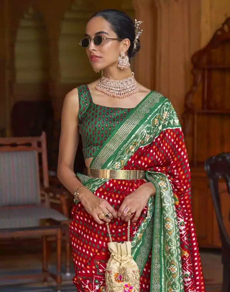 Image of Stylish Red Ikat Patola Fabric Saree