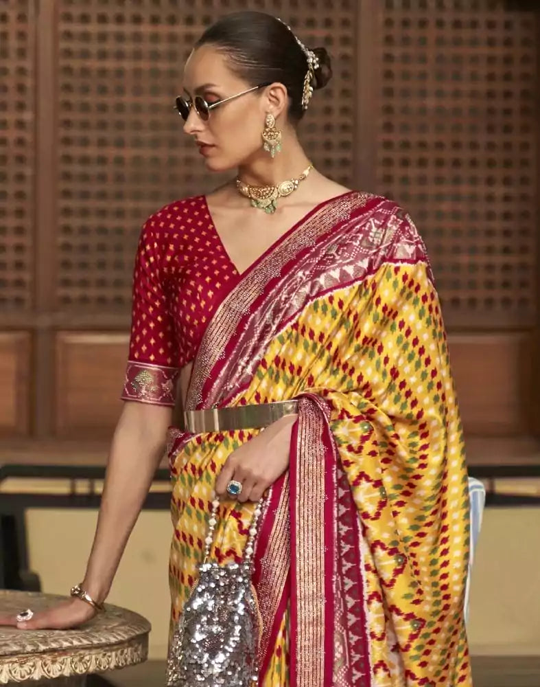 Image of Magnificent Mustard Ikat Patola Printed Saree