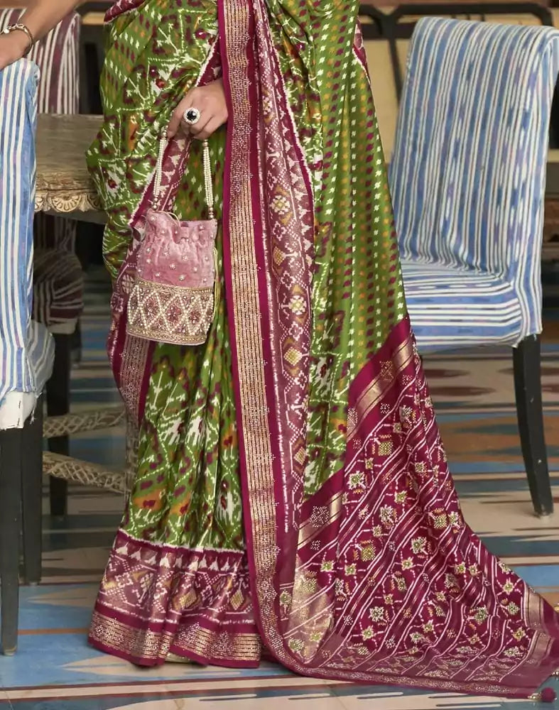Image of Green and Maroon Ikat Patola Printed Saree