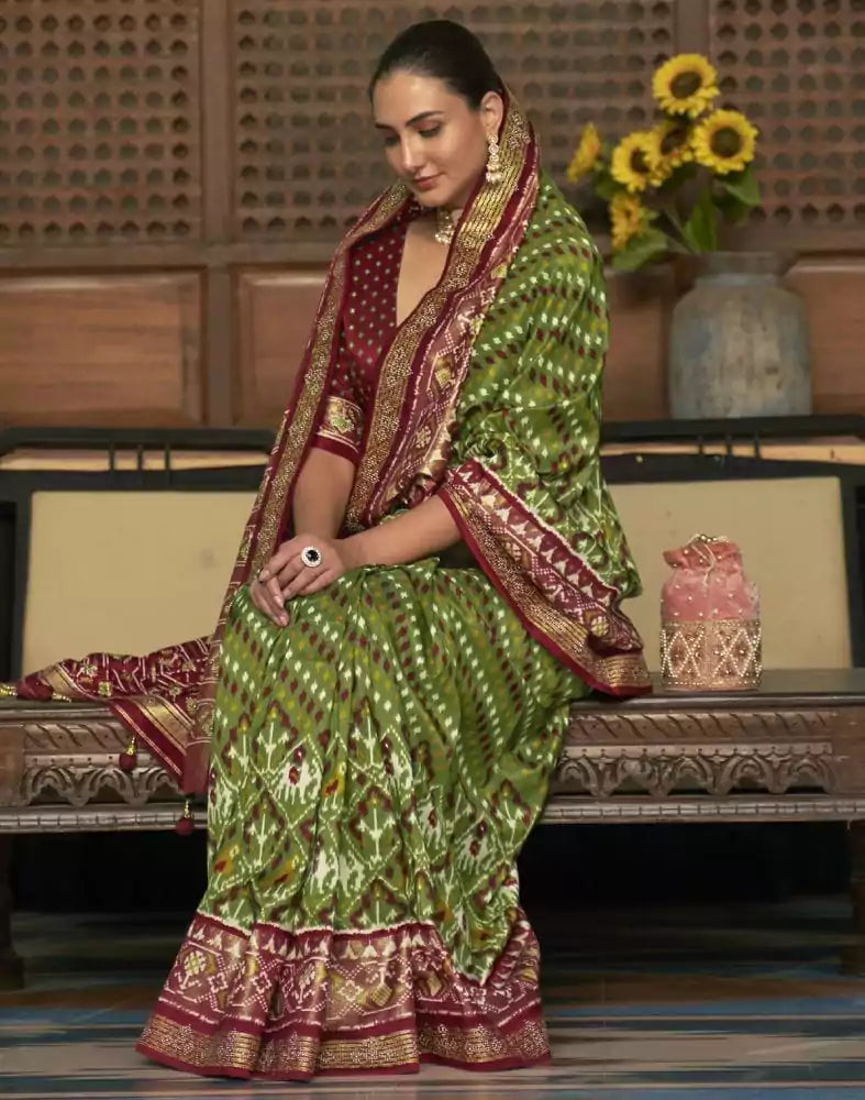 Image of Green and Maroon Ikat Patola Printed Saree