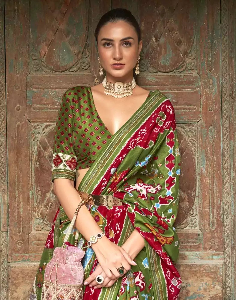 Image of Stupendous Green Ikat Patola Saree