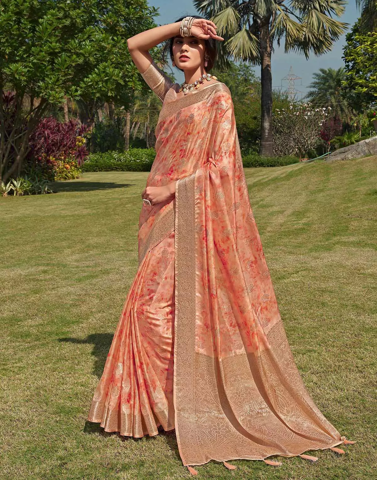 Image of Floral Pattern Orange Colour Soft Silk Saree