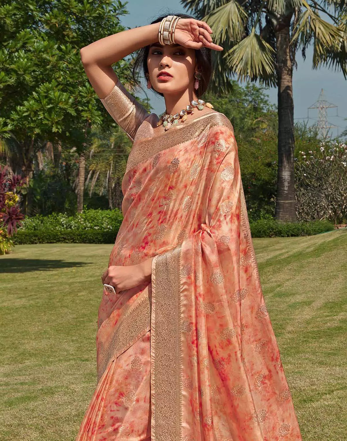 Image of Floral Pattern Orange Colour Soft Silk Saree