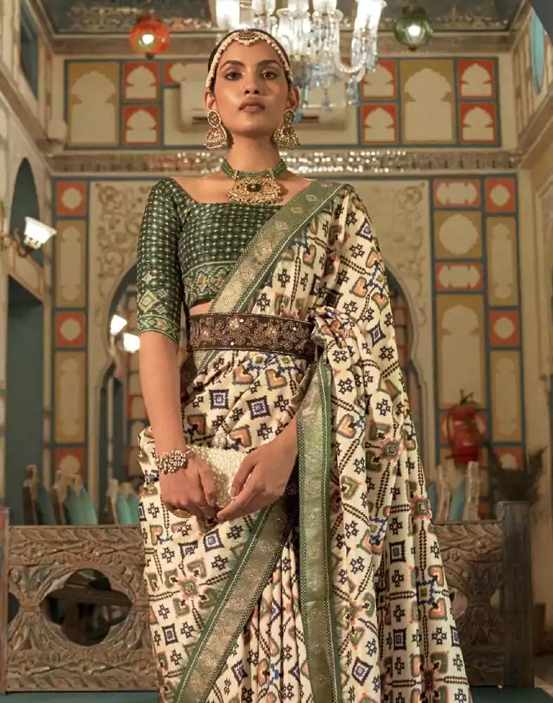 Image of Exclusive Cream Ikat Patola Fabric Saree