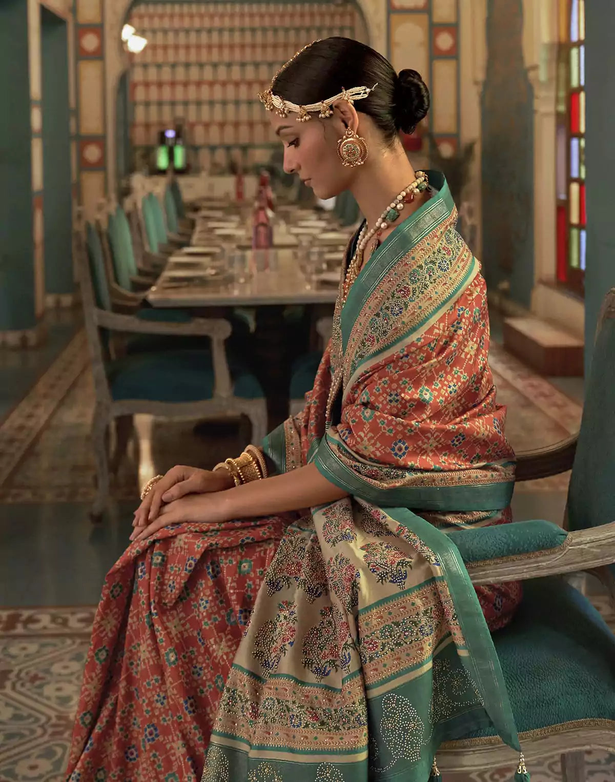 Image of Beautiful Orange Ikat Print Patola Saree