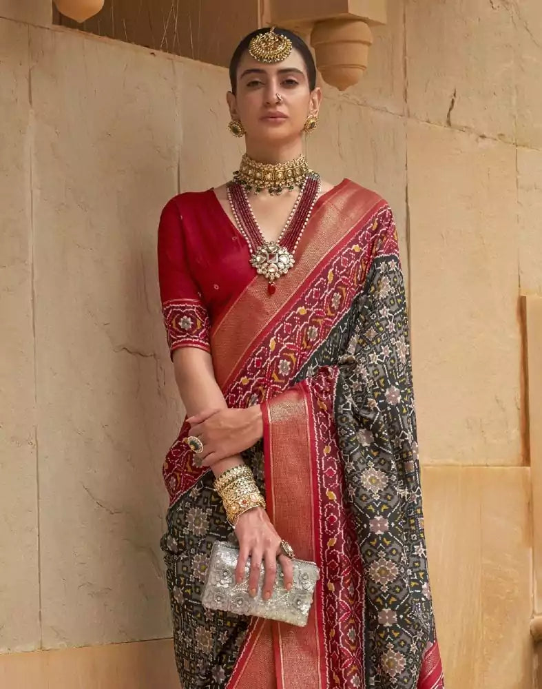 Image of Emerald Black Ikat Print Patola Saree