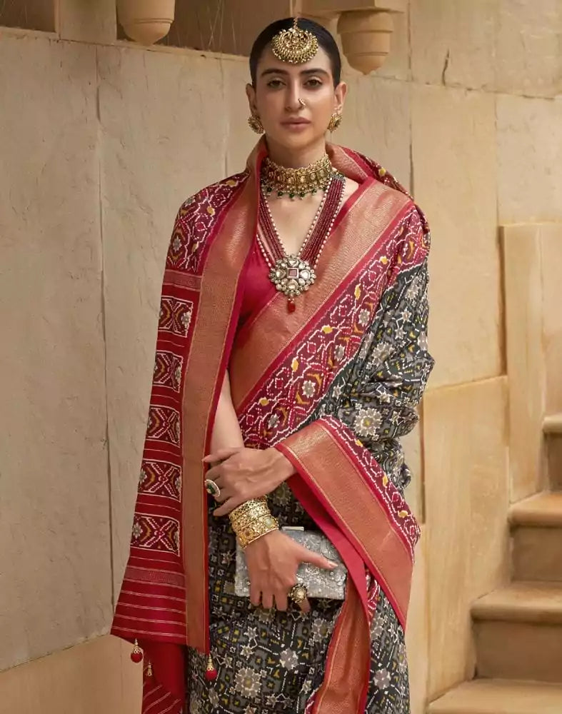 Image of Emerald Black Ikat Print Patola Saree