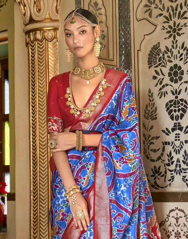Image of Fashionable Sky Blue Ikat Print Patola Saree