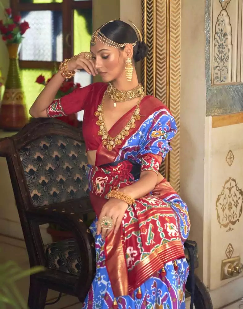 Image of Fashionable Sky Blue Ikat Print Patola Saree