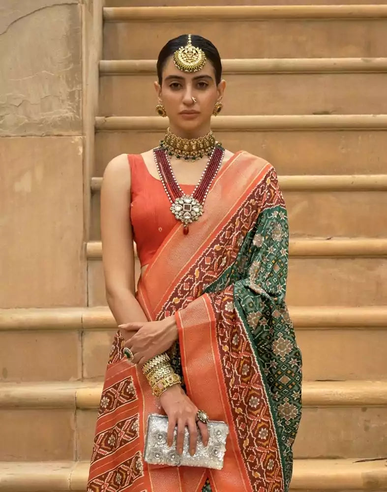 Image of Dark Green Ikat Patola Fabric Saree