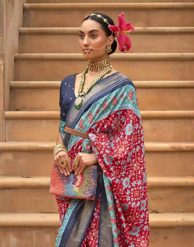 Image of Cherry Red Ikat Patola Fabric Saree