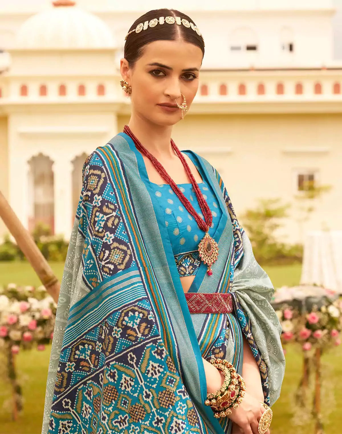 Image of Attractive Sage Green Floral Print Patola Silk Saree