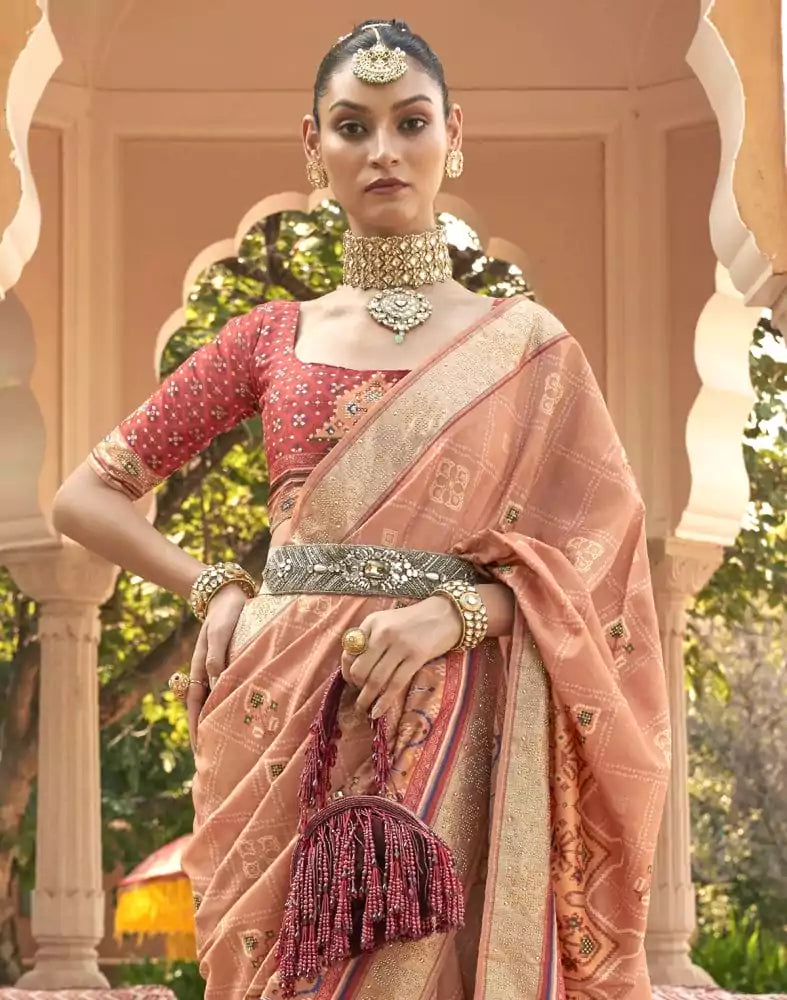 Image of Exclusive Orange Geometric Print Patola Fabric Saree