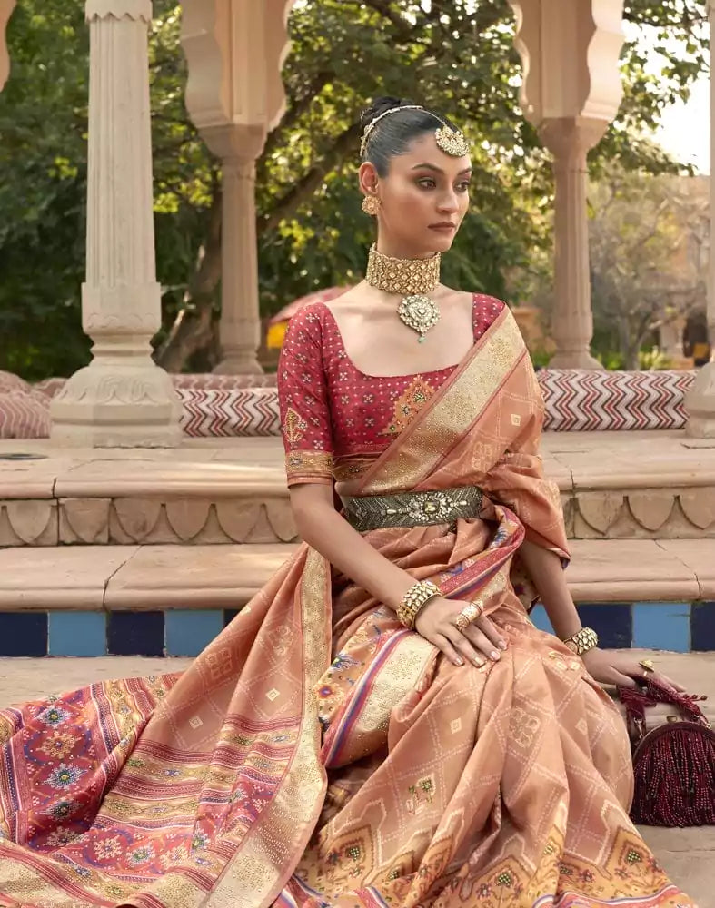 Image of Exclusive Orange Geometric Print Patola Fabric Saree