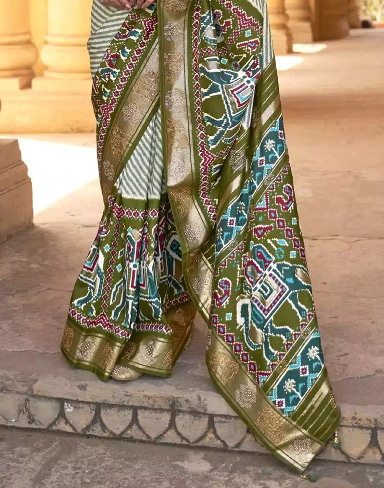 Image of Light Green Striped Pattern Patola Silk Saree