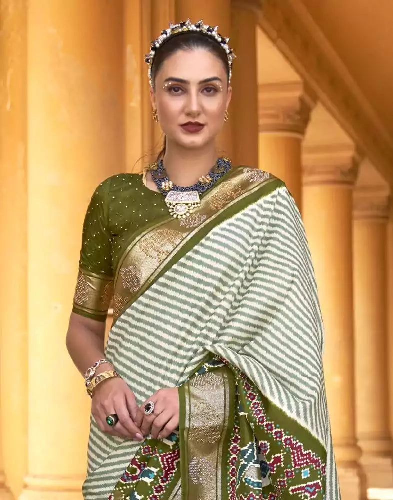 Image of Light Green Striped Pattern Patola Silk Saree