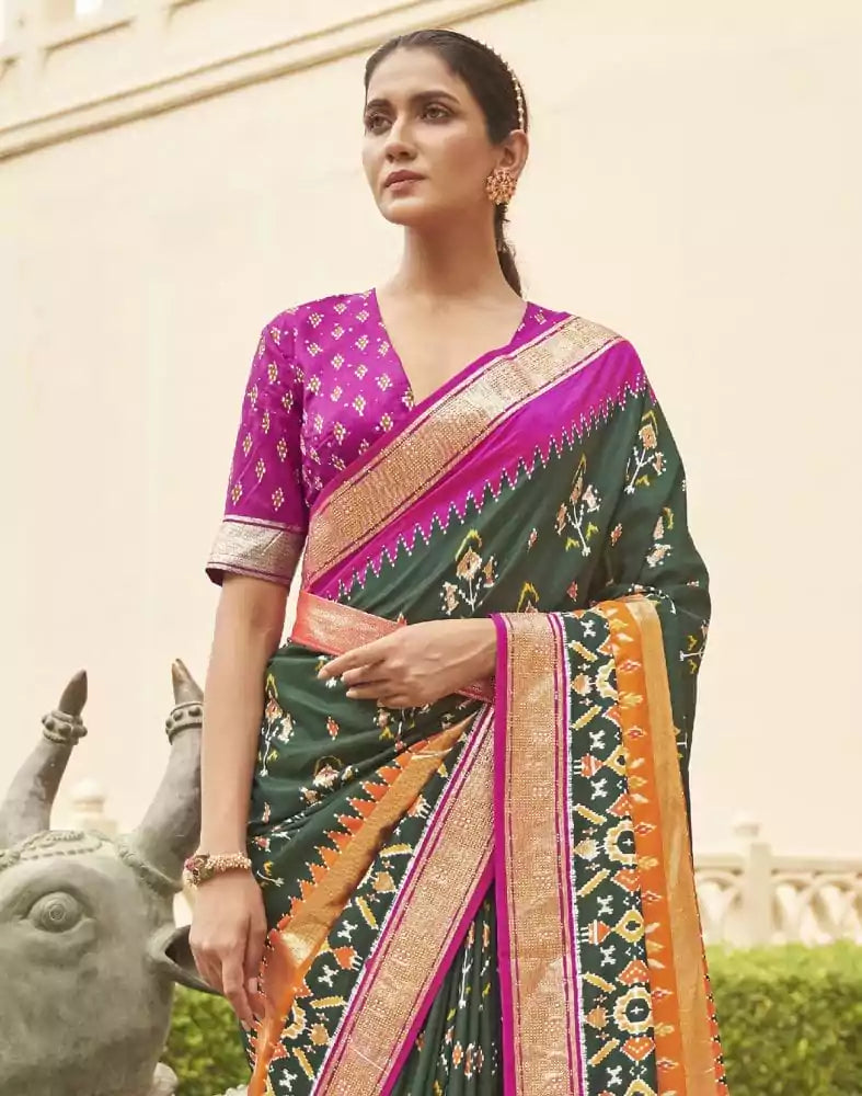 Image of Gorgeous Dark Green Floral Patola Saree