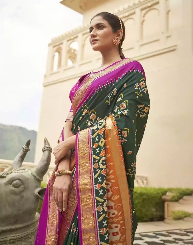 Image of Gorgeous Dark Green Floral Patola Saree