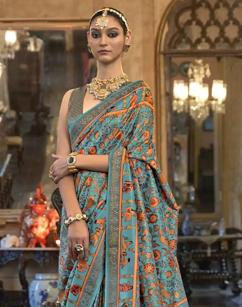 Image of Sky Blue Floral Pattern Patola Mica Print Saree