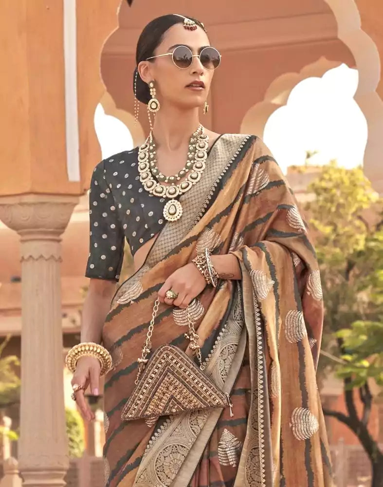 Image of Brown Ethnic Motifs Printed Patola Silk Saree