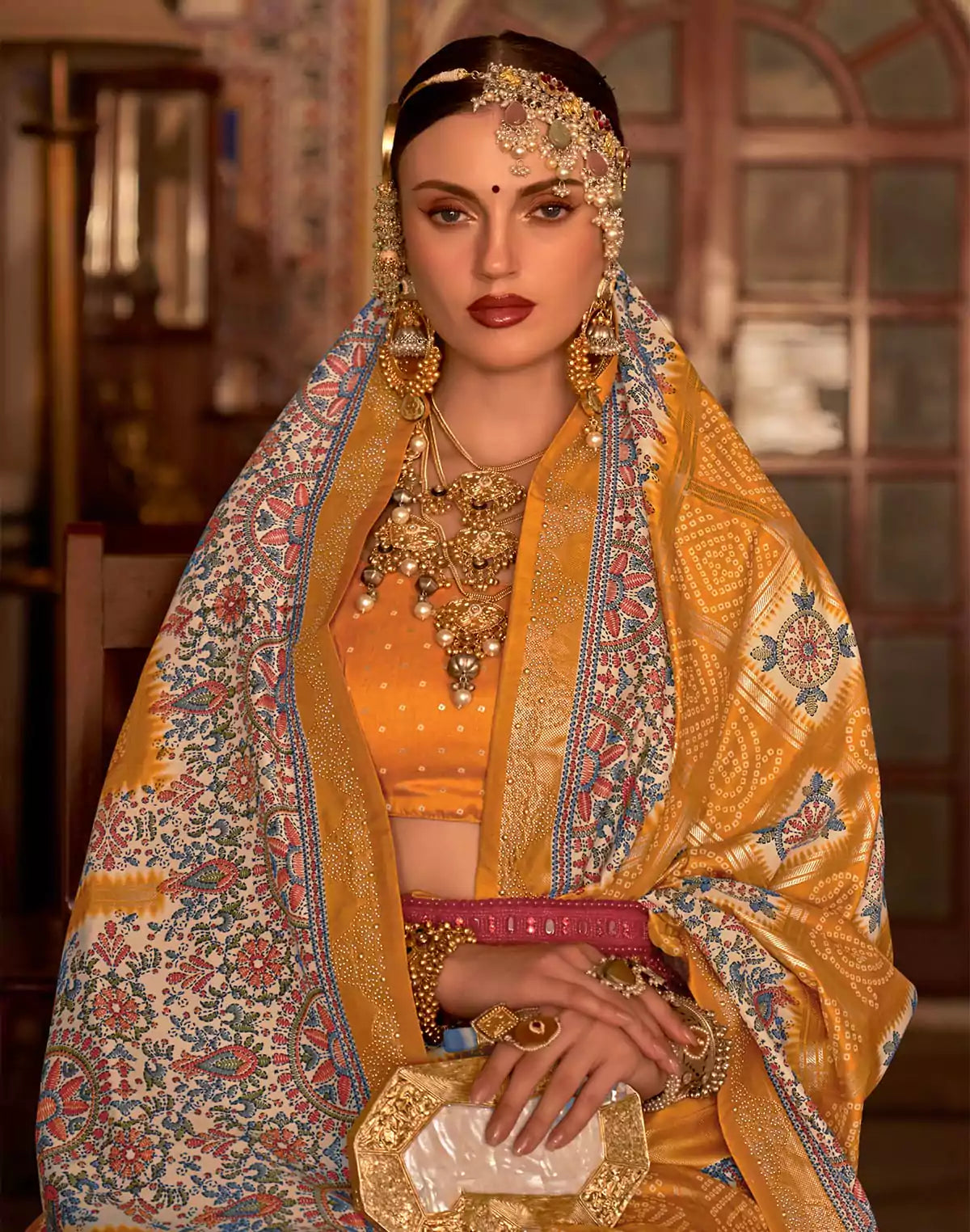 Image of Mustard Bandhini Print smooth Patola Silk Saree