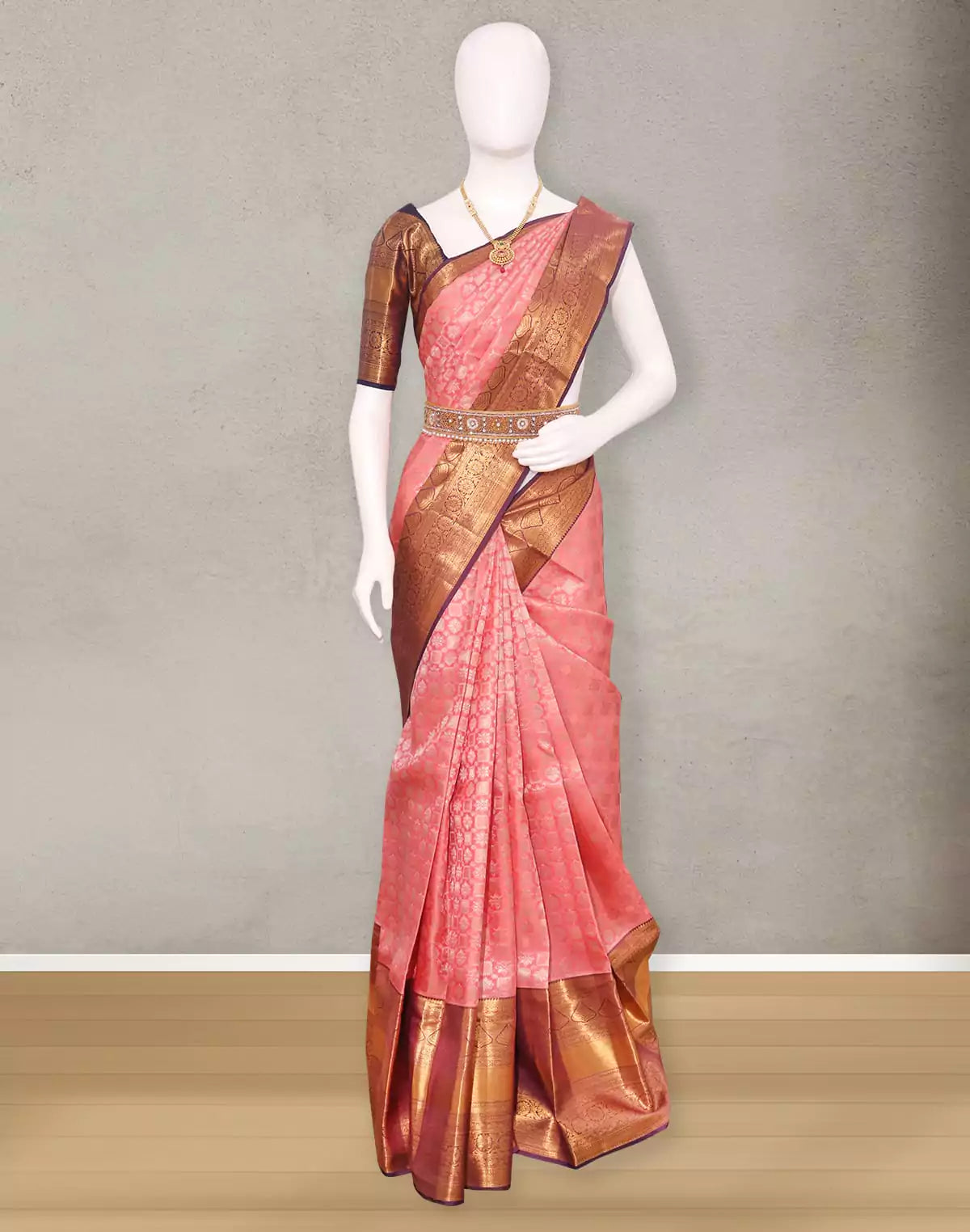 Image of Attractive Peach Copper Zari skut border Saree
