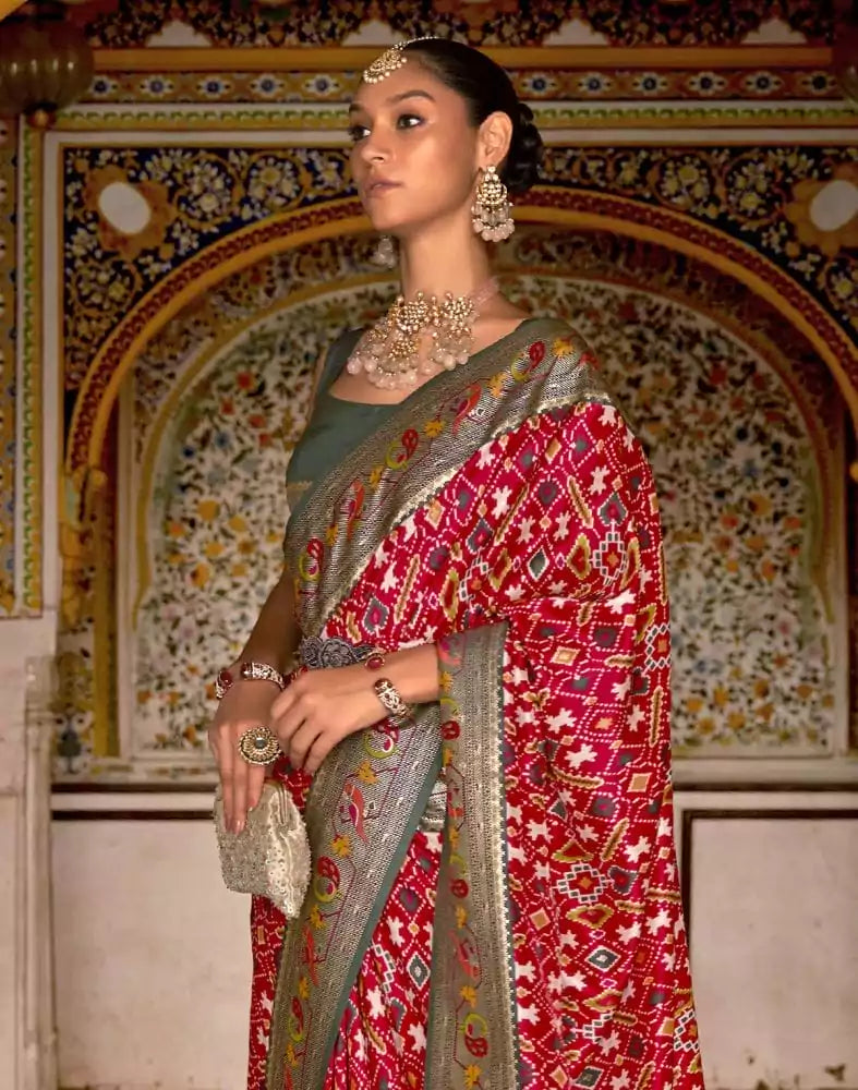Image of Red and Green Coloured Patola Silk Saree