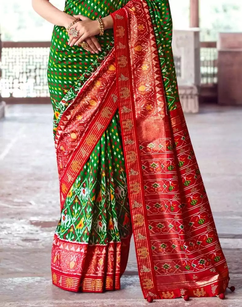 Image of Green Ikat Pattern Patola Fabric Saree