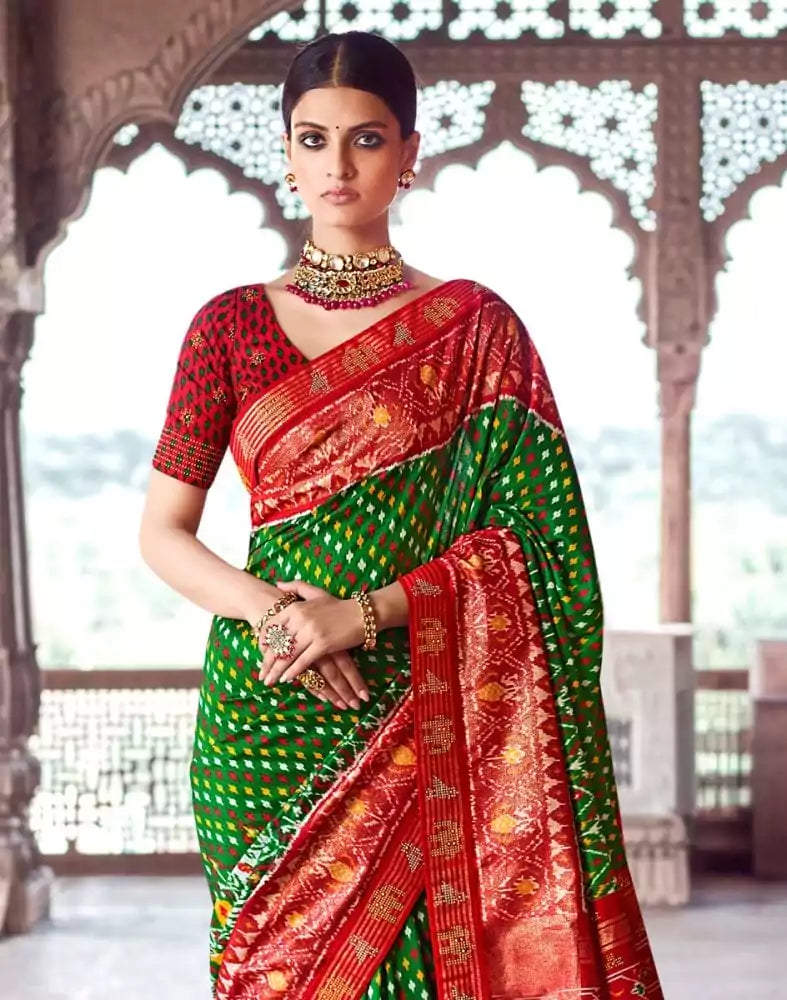 Image of Green Ikat Pattern Patola Fabric Saree