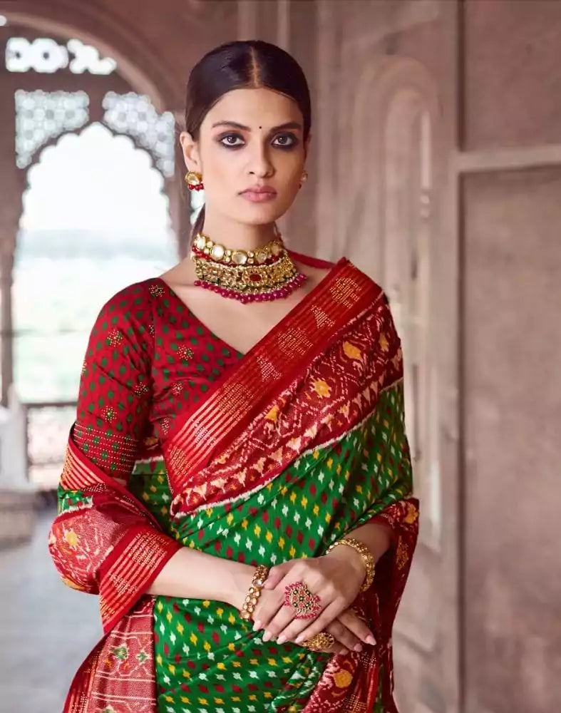 Image of Green Ikat Pattern Patola Fabric Saree
