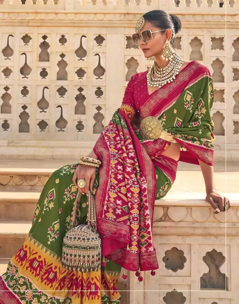 Image of Stylish Mehendi Green Ikat Print Patola Saree