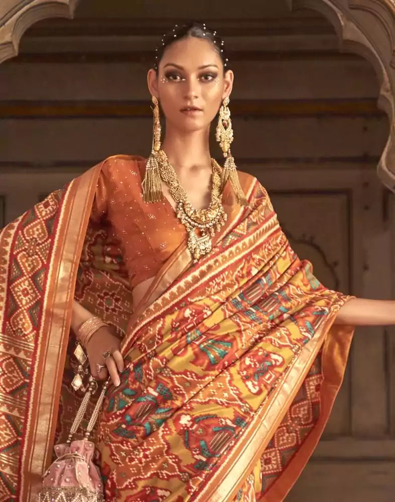 Image of Orange Ikat Weaving Patola Saree