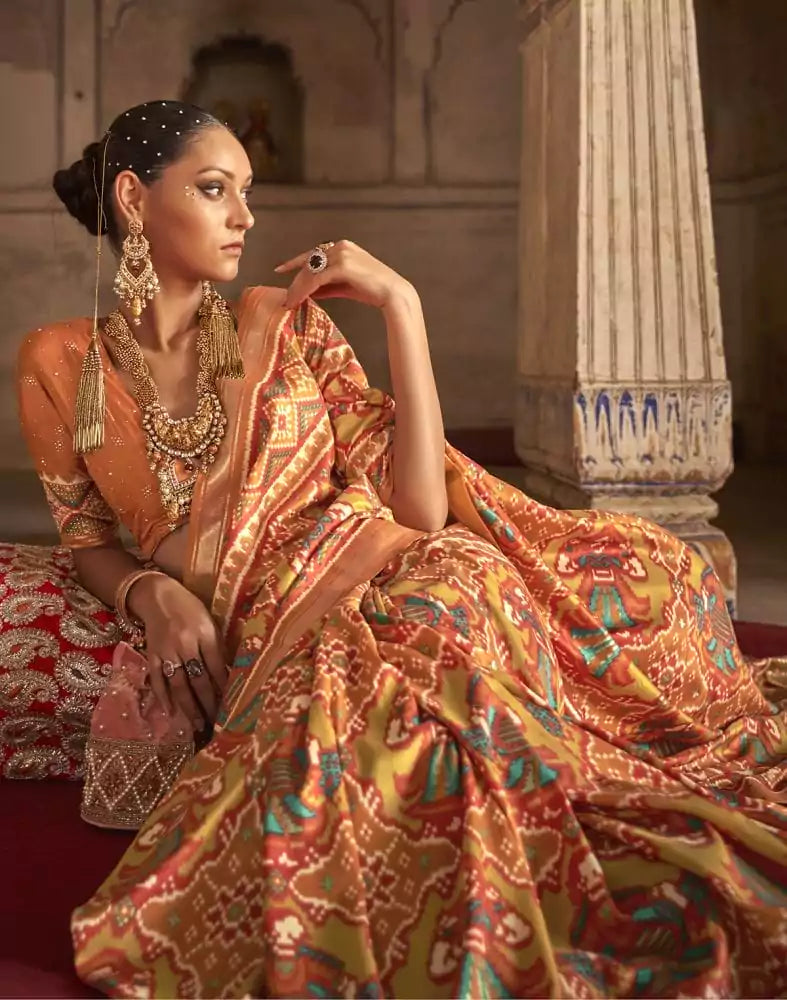 Image of Orange Ikat Weaving Patola Saree