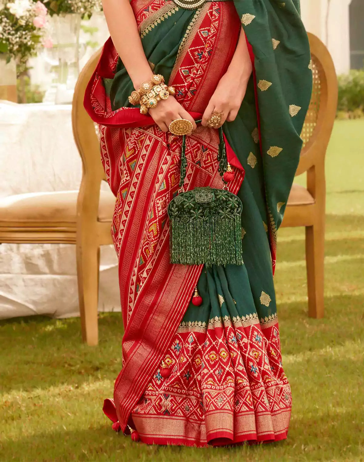 Image of Emerald Green Coloured Patola Fancy Saree
