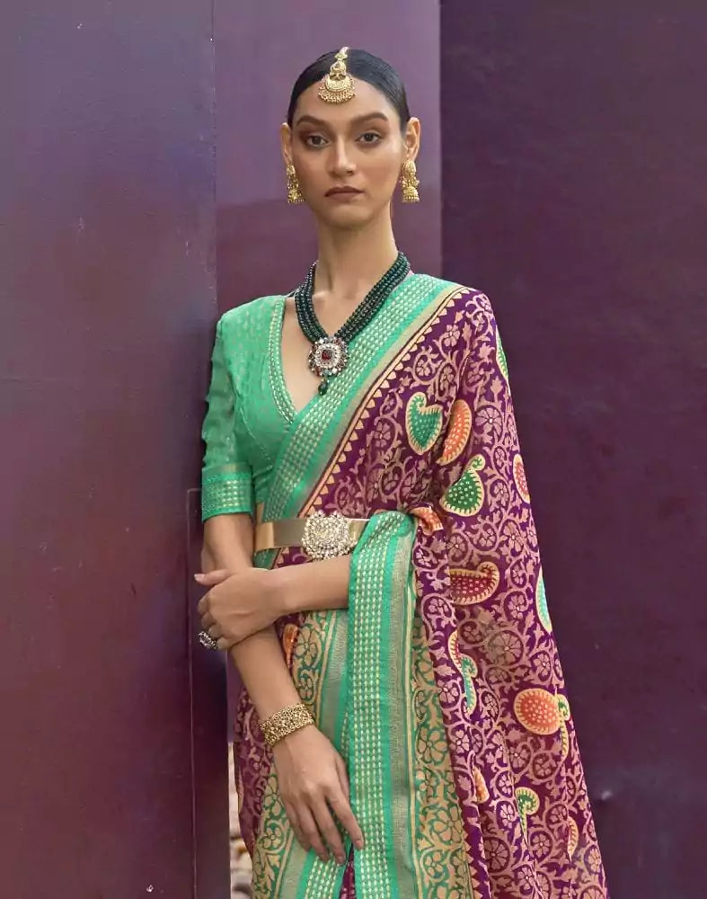 Image of Magenta and Sea Green Coloured Brasso Saree