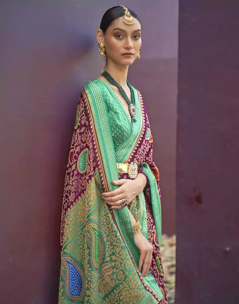 Image of Magenta and Sea Green Coloured Brasso Saree