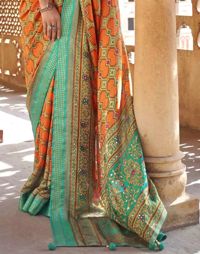 Image of Fascinating Orange Geometric Print Patola Saree