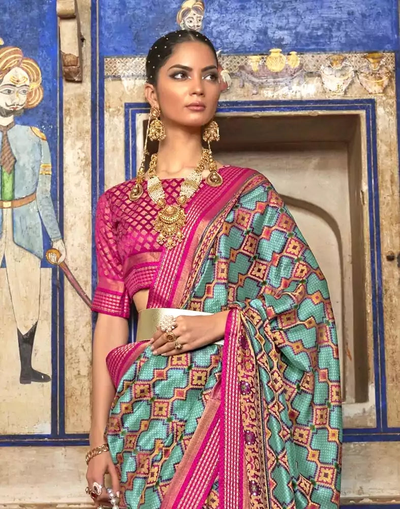 Image of Magnificent Sky Blue Geometric Print Patola Saree
