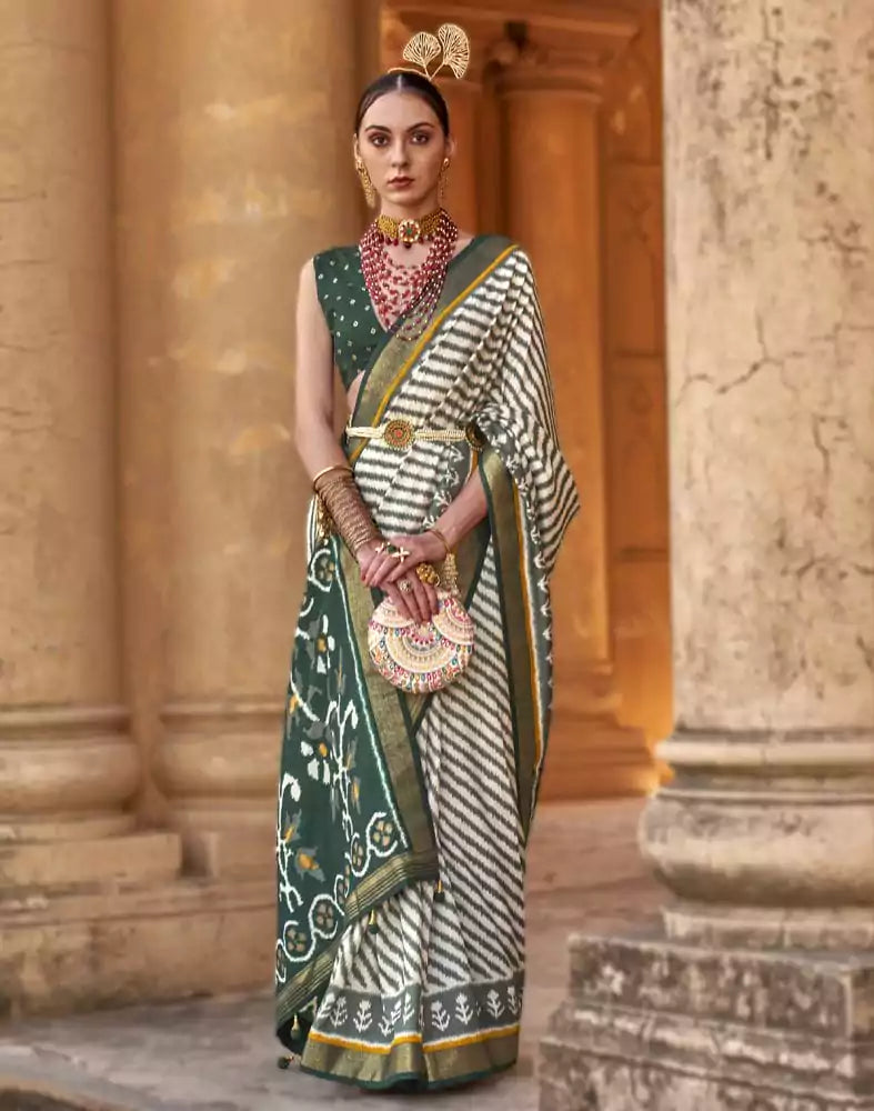 Image of Off White Stripes Pattern Patola Fabric Saree