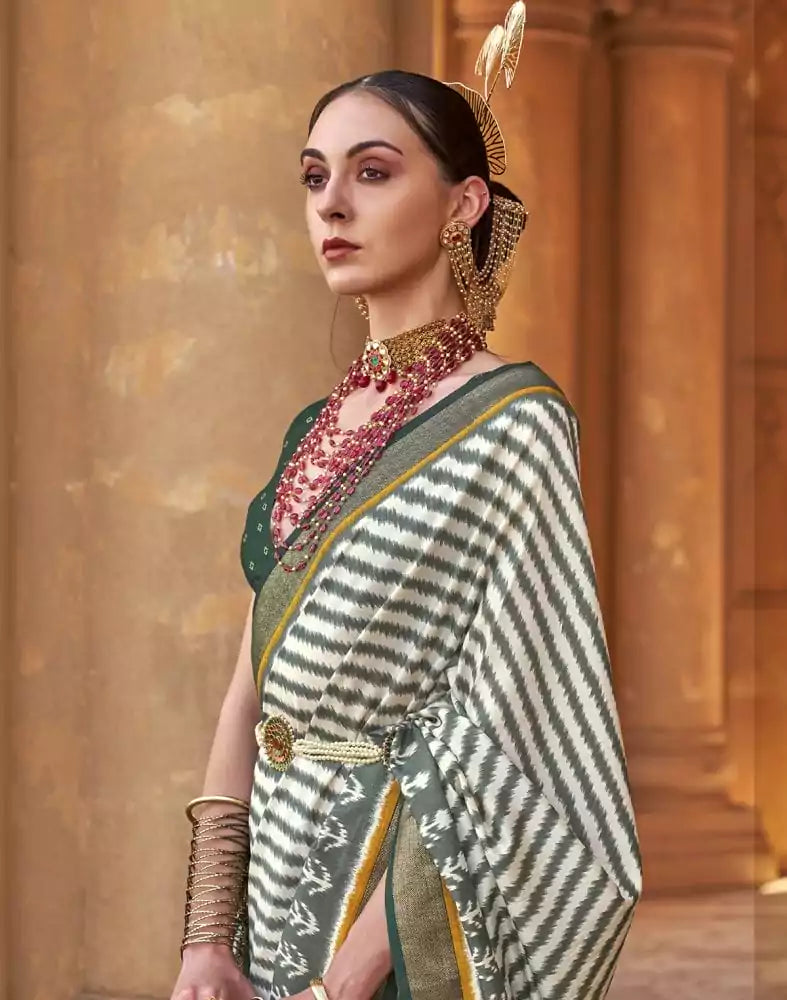 Image of Off White Stripes Pattern Patola Fabric Saree