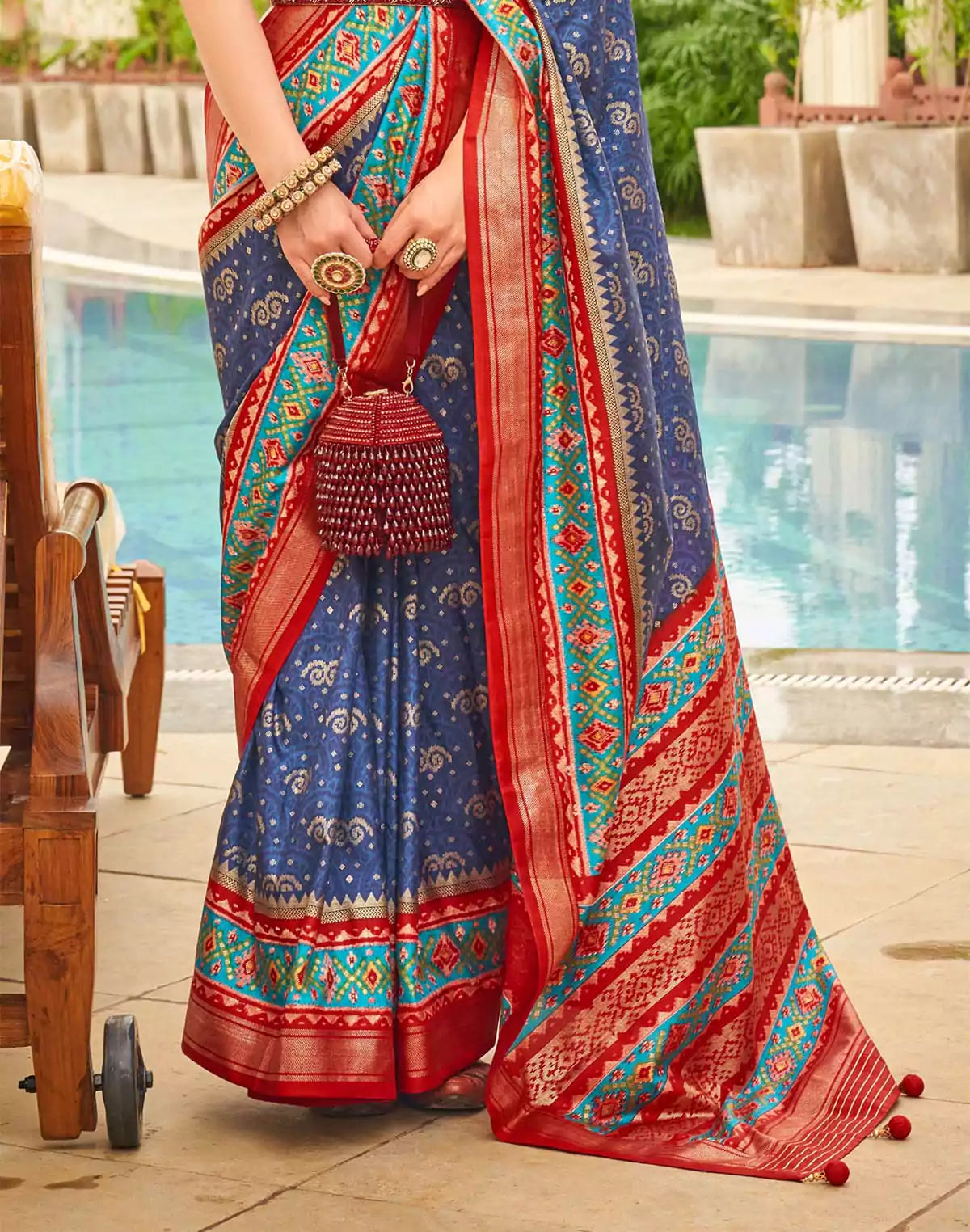 Image of Light Blue Ethnic Motif Printed Patola Silk Saree