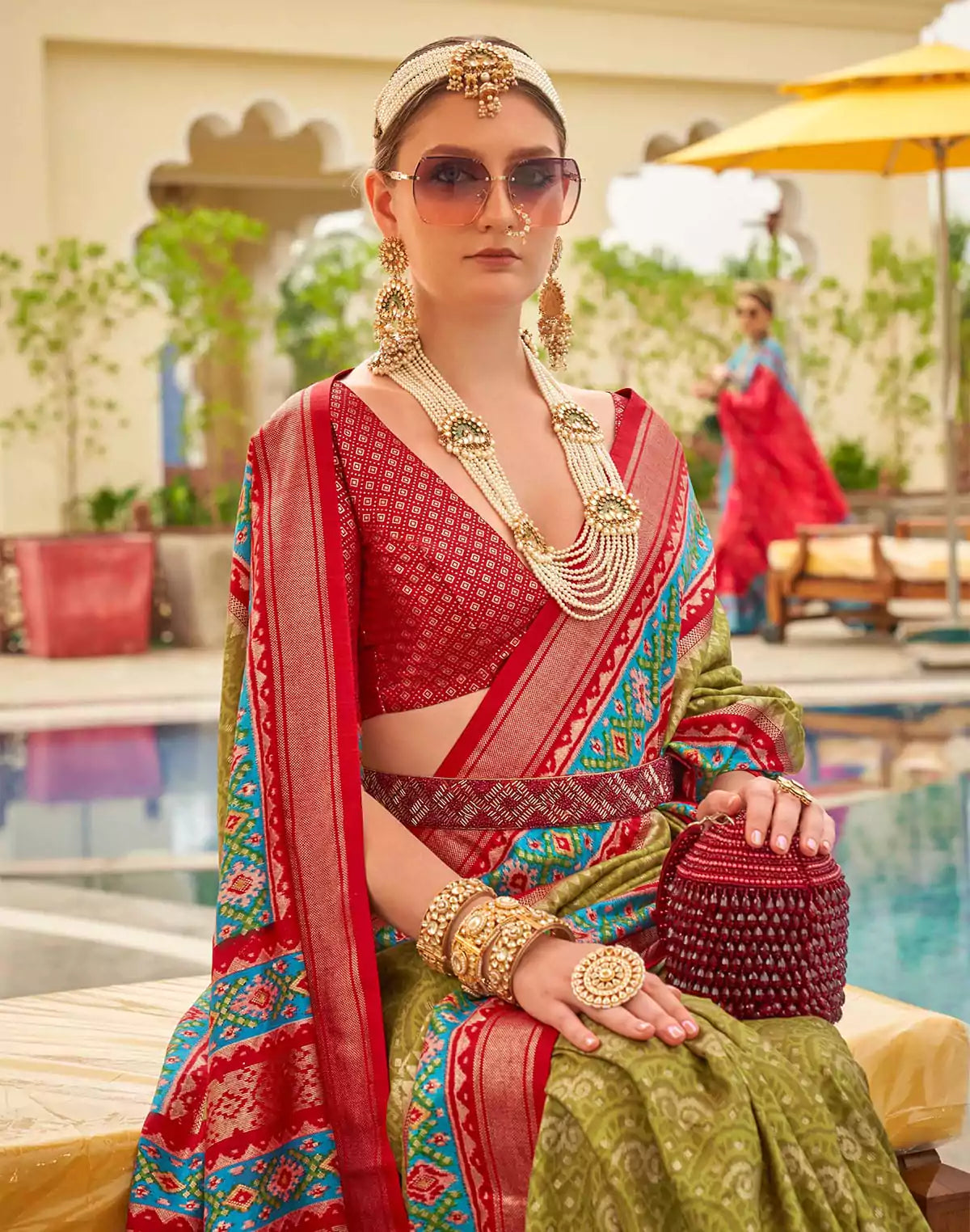 Image of Patola Silk Fabric Mehendi Green Contrast Saree