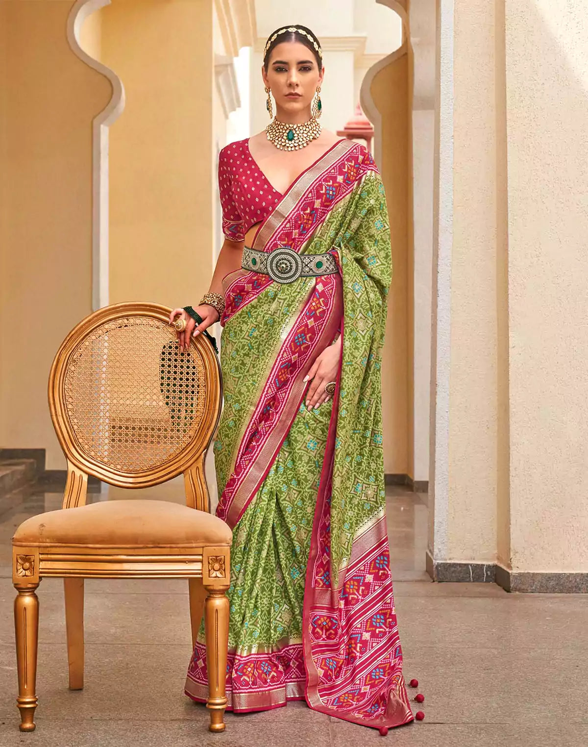 Image of Green Patola Saree with Red Border