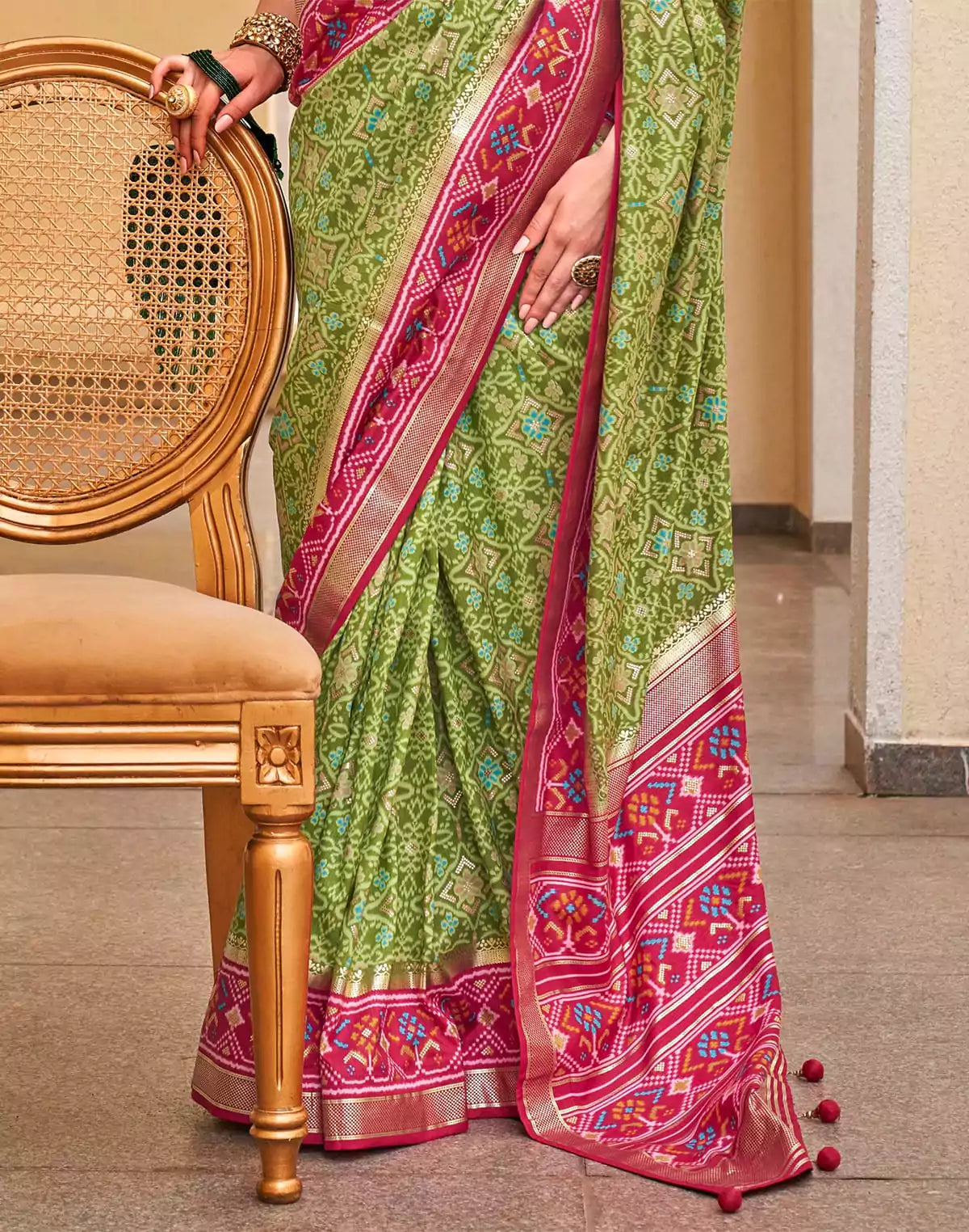 Image of Green Patola Saree with Red Border