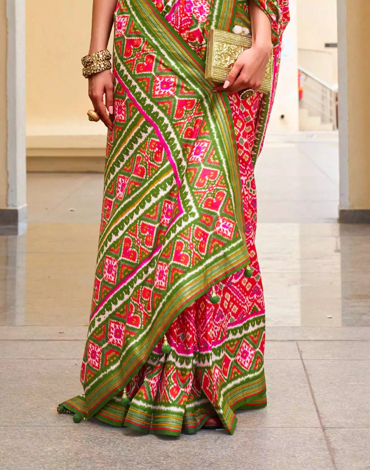 Image of Pink Woven Design Patola Saree with Tussels